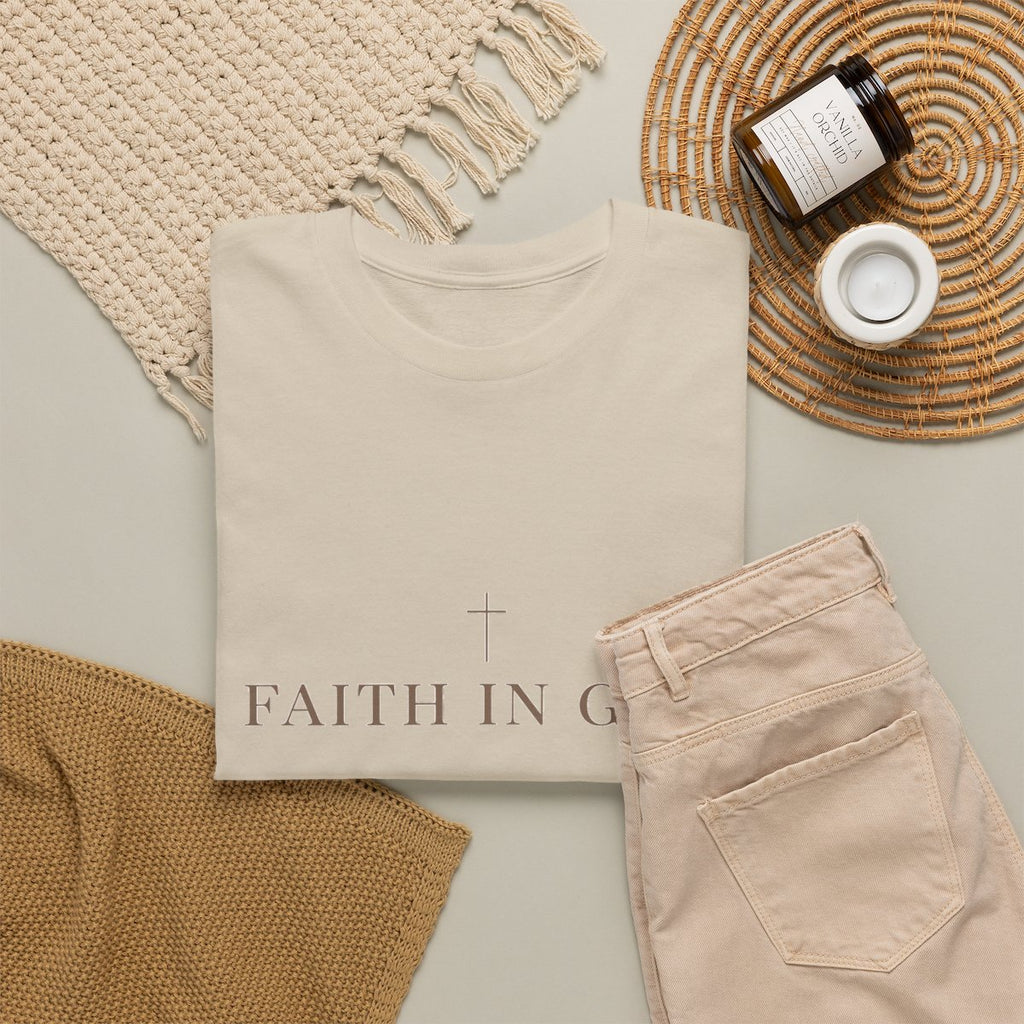 Saints Supply Co Faith in God graphic tee, Sand, flat lay view